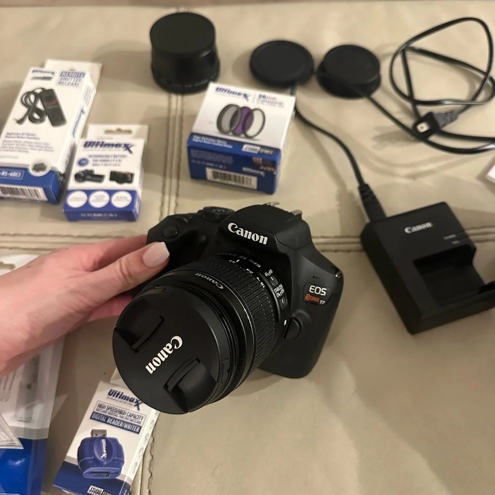 Canon DSLR Camera in Black with Attached Lens
